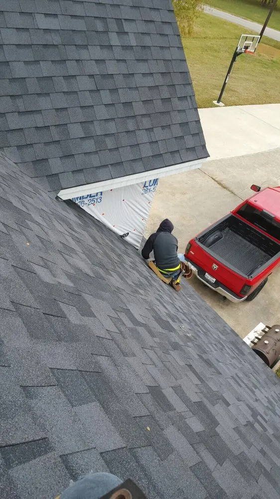 Slide of Champ Vision Roofing Services