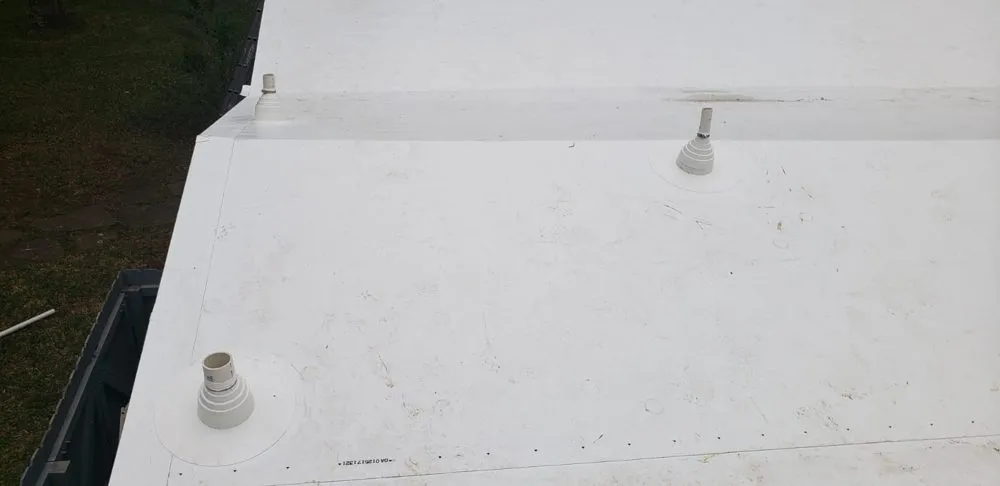 Slide of Champ Vision Roofing Services