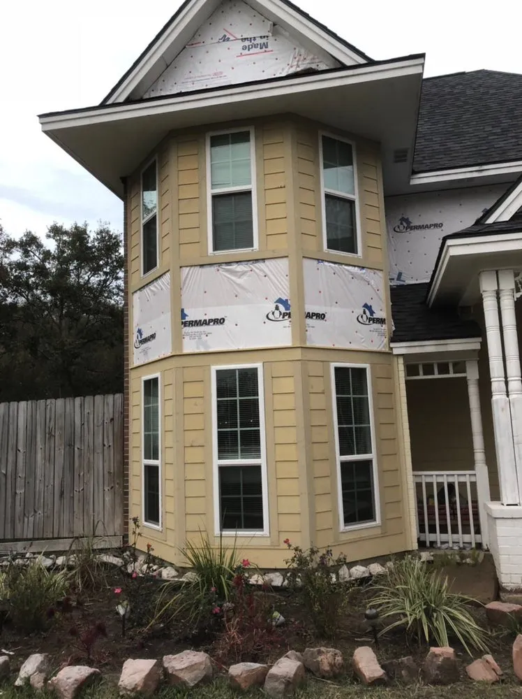 Slide of Champ Vision Roofing Services