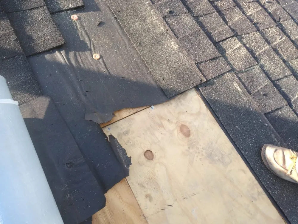 Slide of Champ Vision Roofing Services