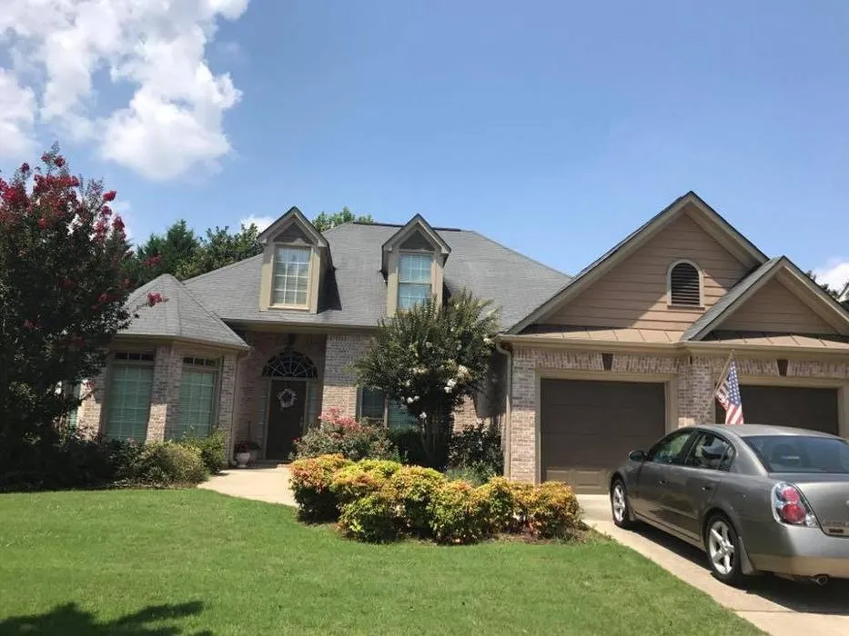 Slide of Champion Roofing