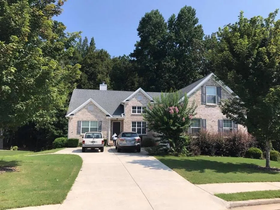 Slide of Champion Roofing