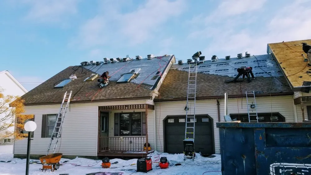 Slide of Champlain Roofing