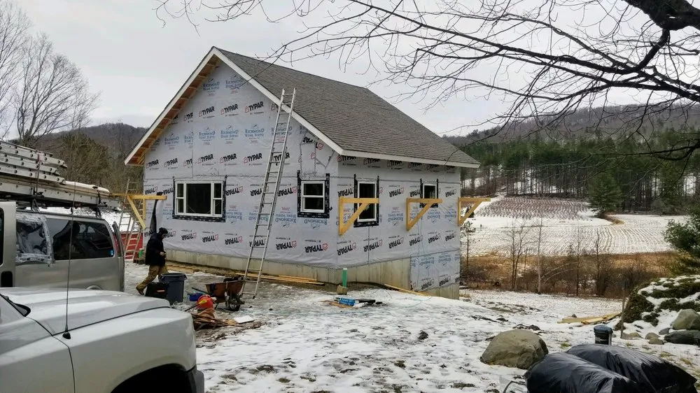 Slide of Champlain Roofing
