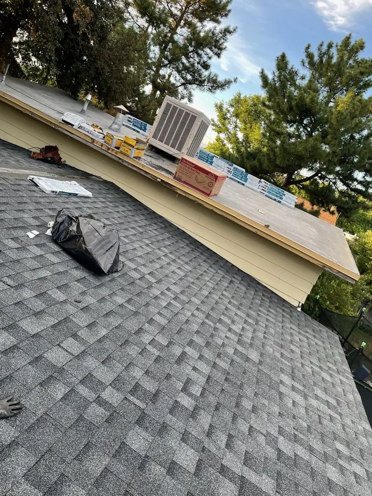 Slide of Champs Roofing