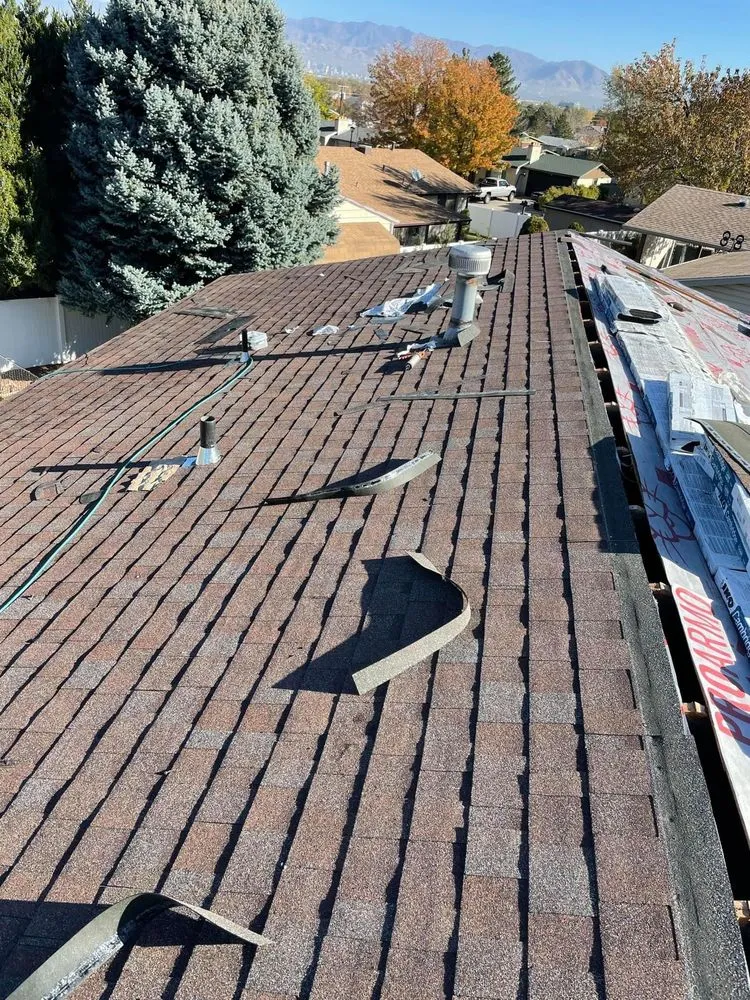 Slide of Champs Roofing