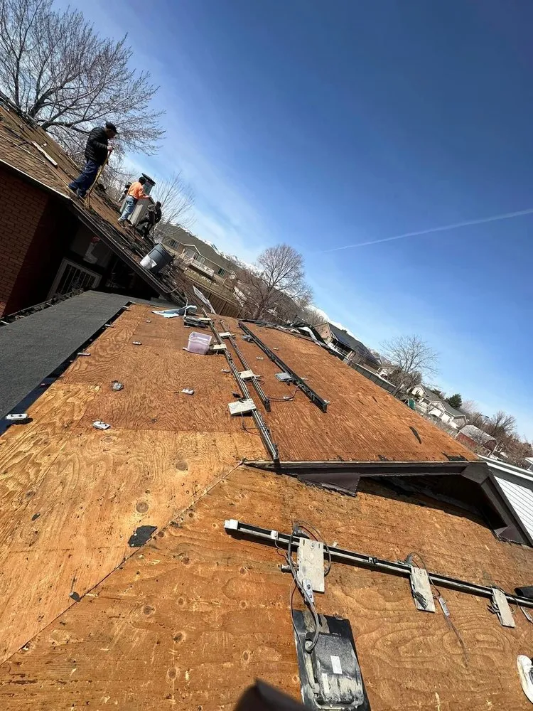 Slide of Champs Roofing