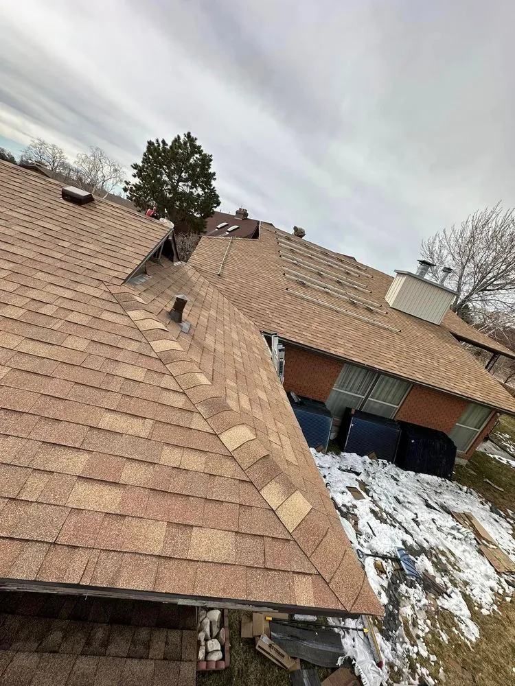 Slide of Champs Roofing