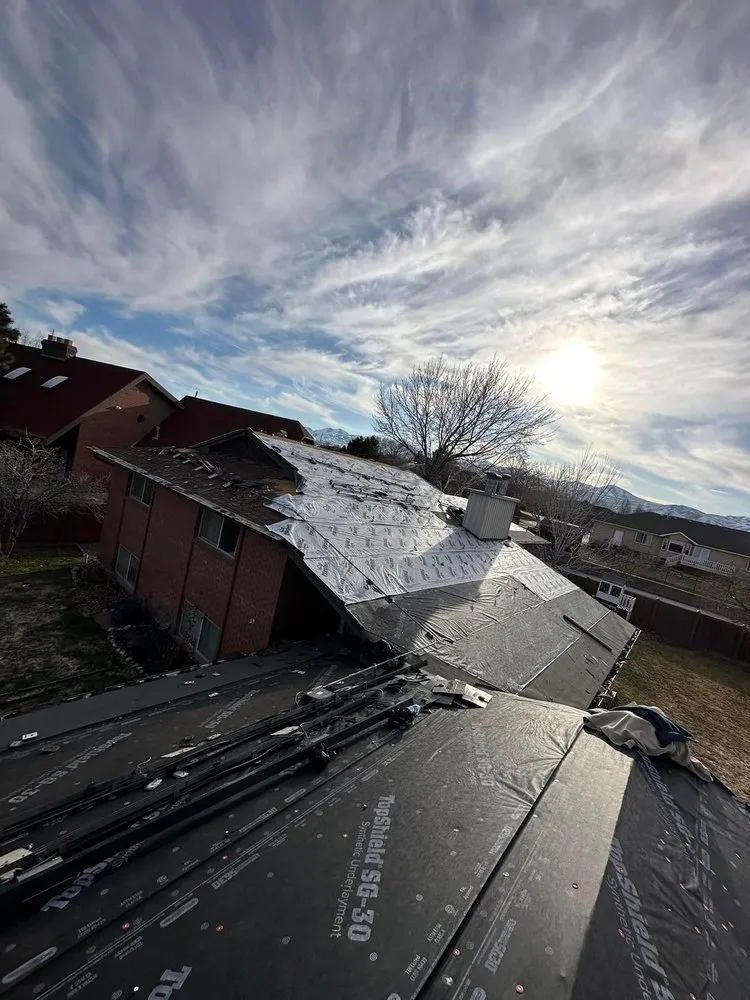 Slide of Champs Roofing