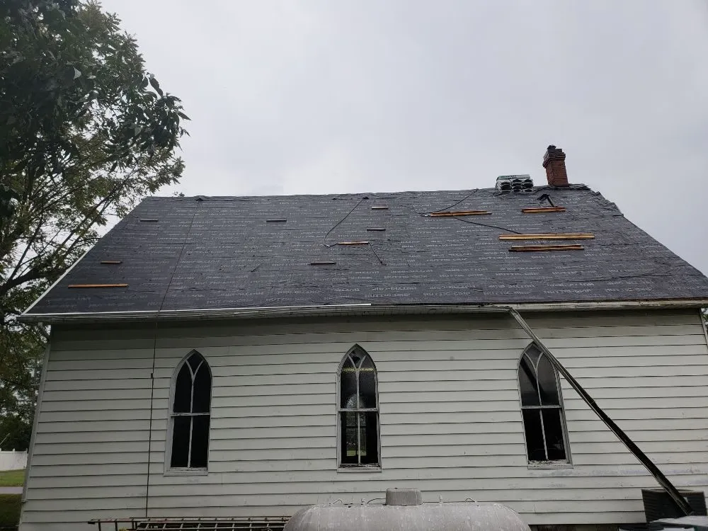 Slide of Chango's Roofing Services