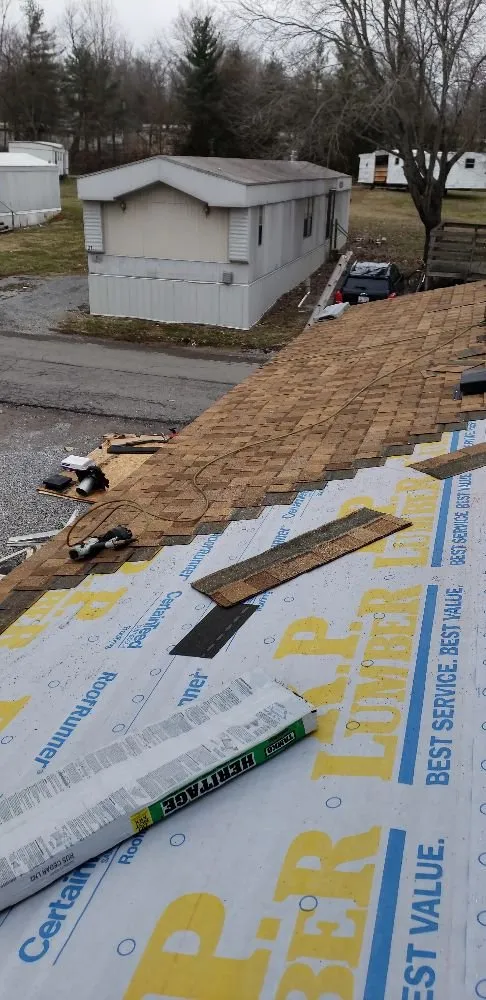 Slide of Chango's Roofing Services