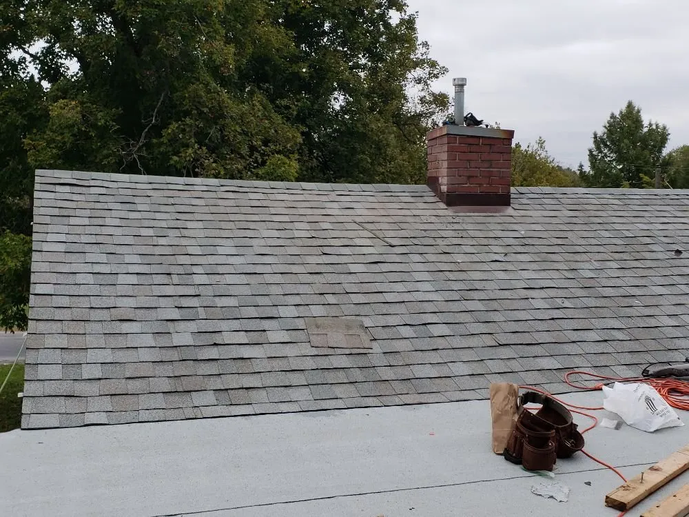 Slide of Chango's Roofing Services