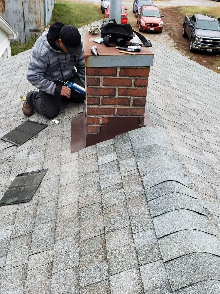 Slide of Chango's Roofing Services