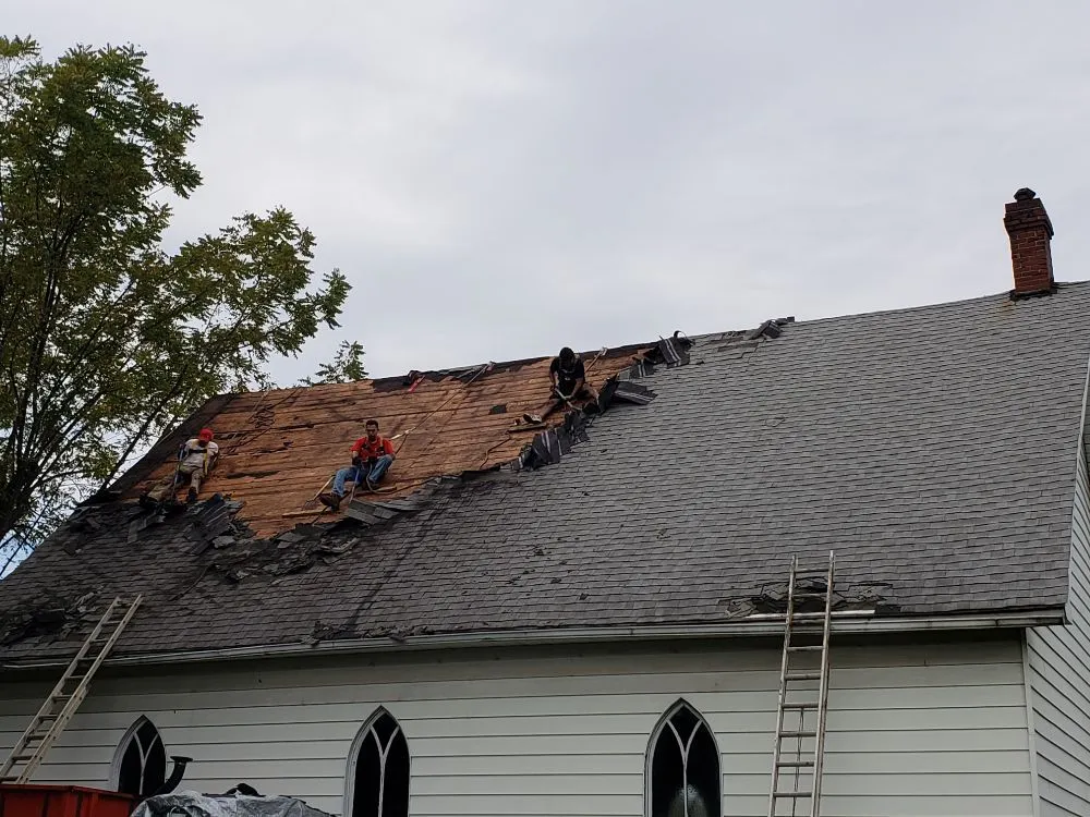 Slide of Chango's Roofing Services