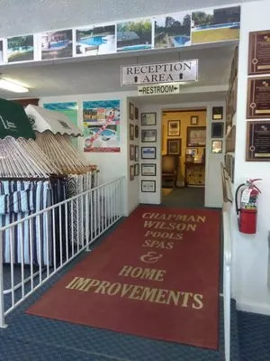 Chapman - Wilson Pools, Spas & Home Improvements Logo