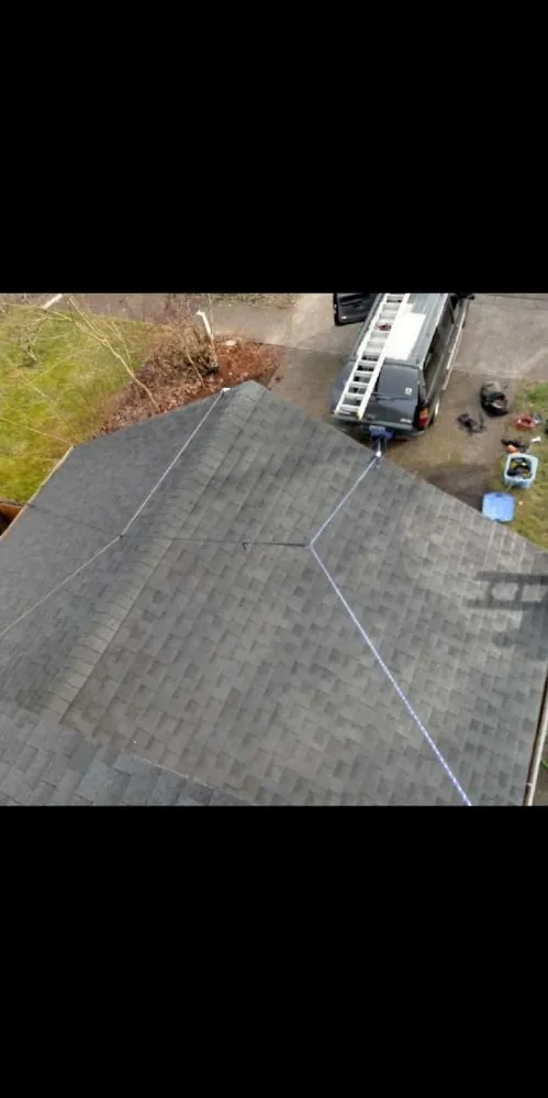 Slide of Charity's Roof and Gutter Cleaning