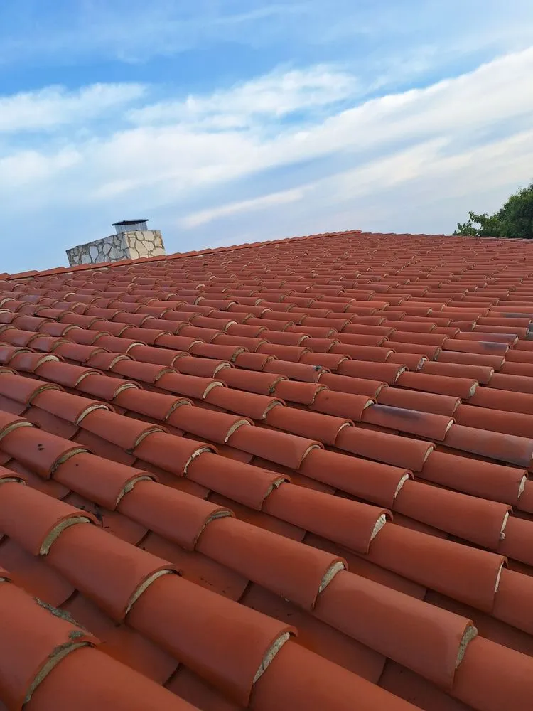 Slide of Charles Johnson Roofing Inc