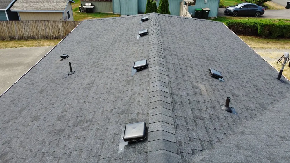 Slide of Charlie Roofing