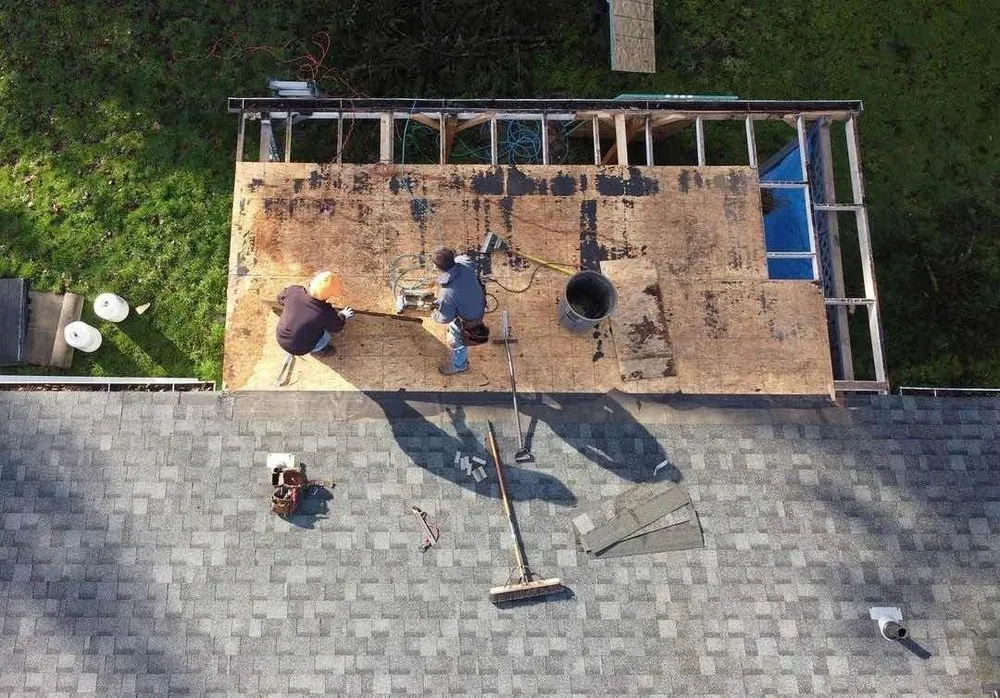 Slide of Charlie Roofing