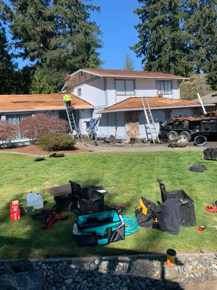 Slide of Charlie Roofing