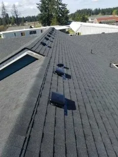 Slide of Charlie Roofing