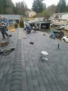 Slide of Charlie Roofing