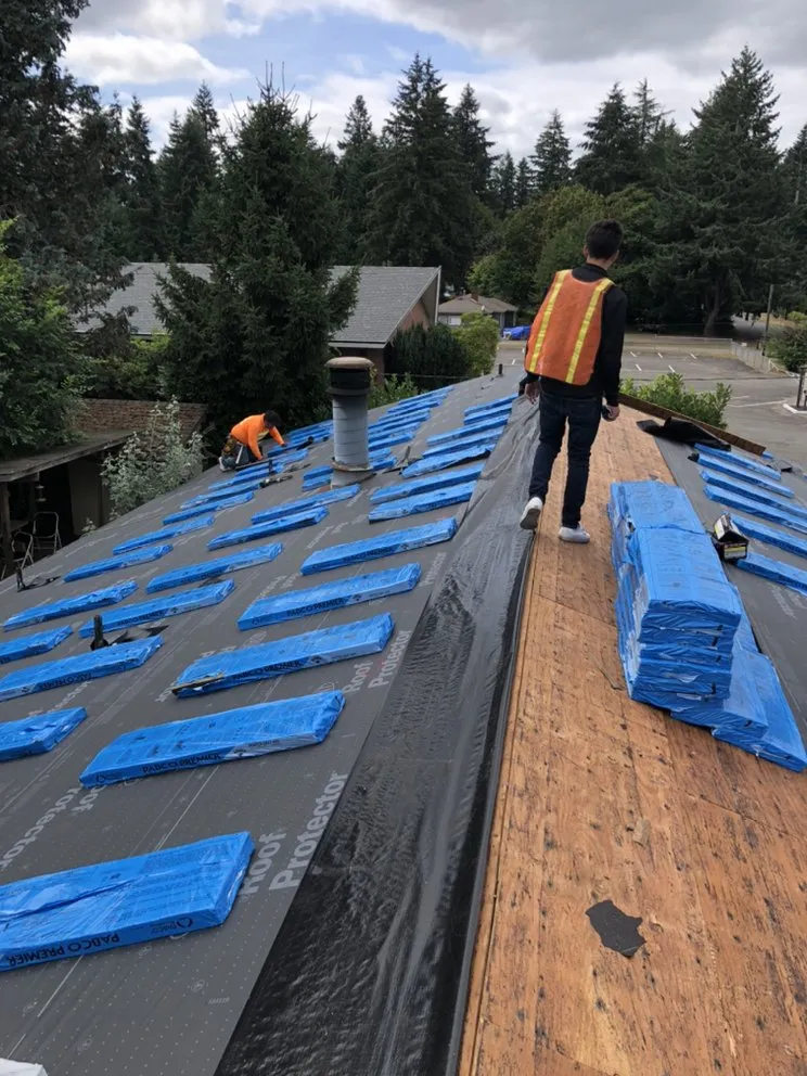 Slide of Charlie Roofing