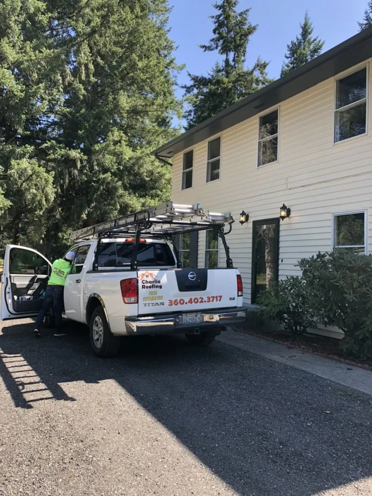 Slide of Charlie Roofing