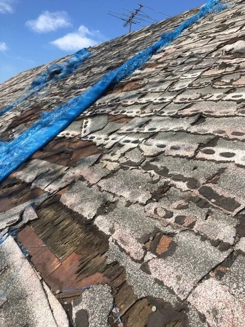 Slide of Charlie's Expert Roofing