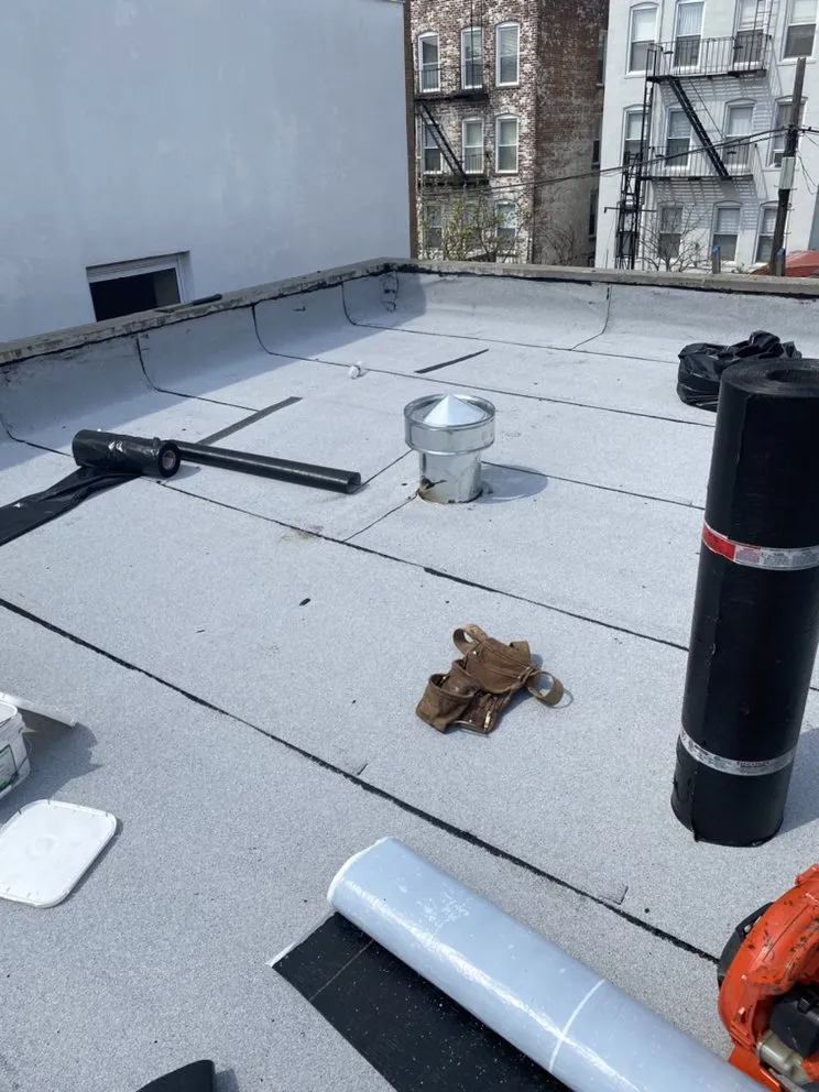 Slide of Charlie's Expert Roofing