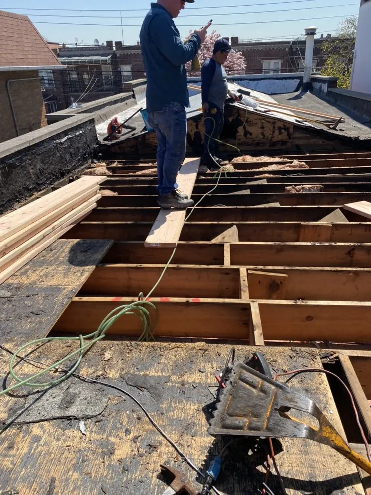 Slide of Charlie's Expert Roofing