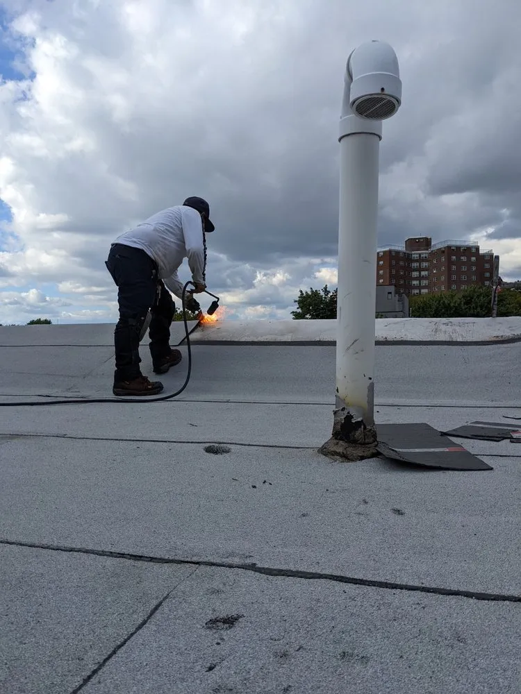 Slide of Charlie's Expert Roofing