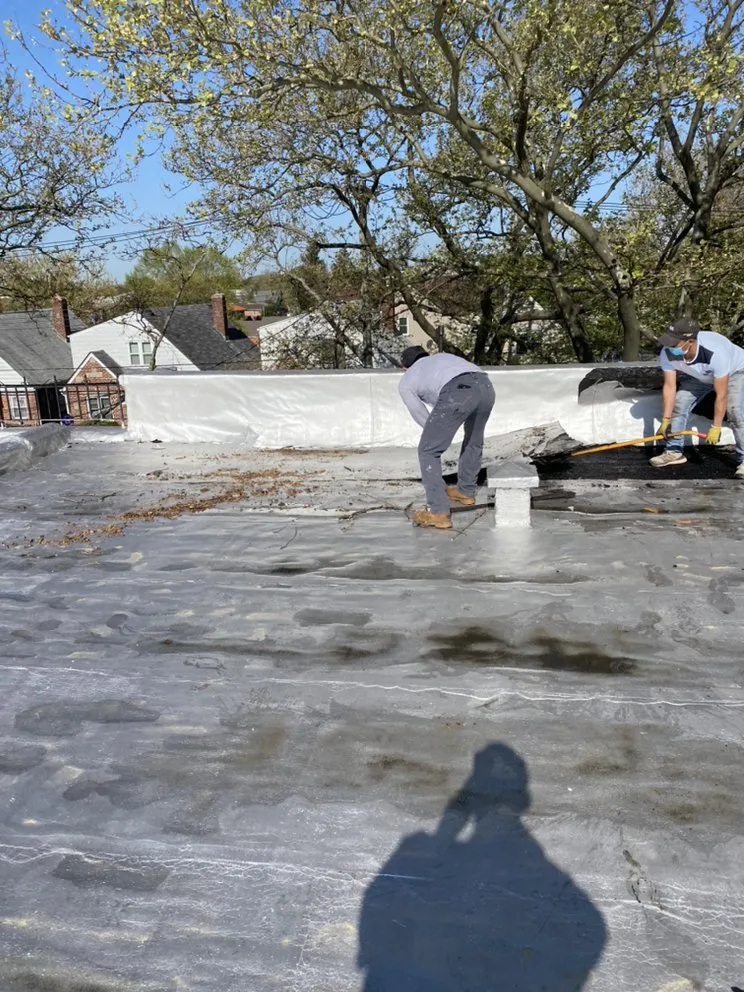 Slide of Charlie's Expert Roofing