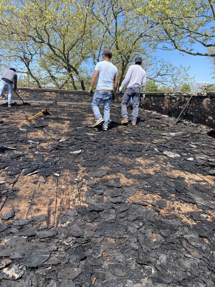 Slide of Charlie's Expert Roofing