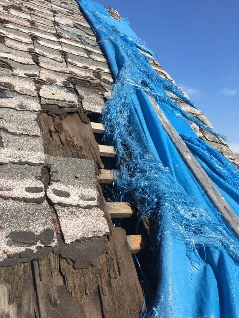 Slide of Charlie's Expert Roofing