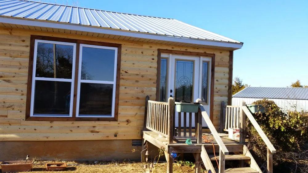 Slide of Charlie's Roofing Windows and More