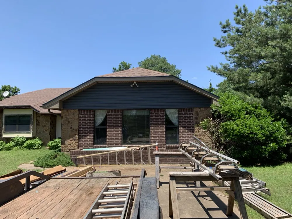 Slide of Charlie's Roofing Windows and More