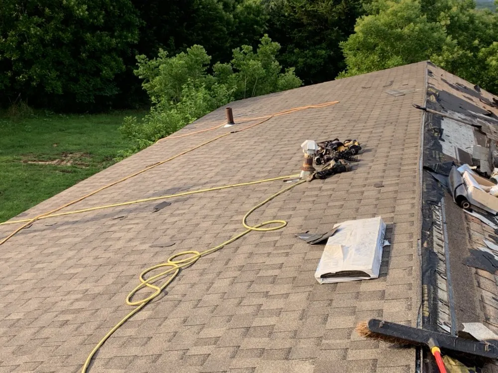 Slide of Charlie's Roofing Windows and More