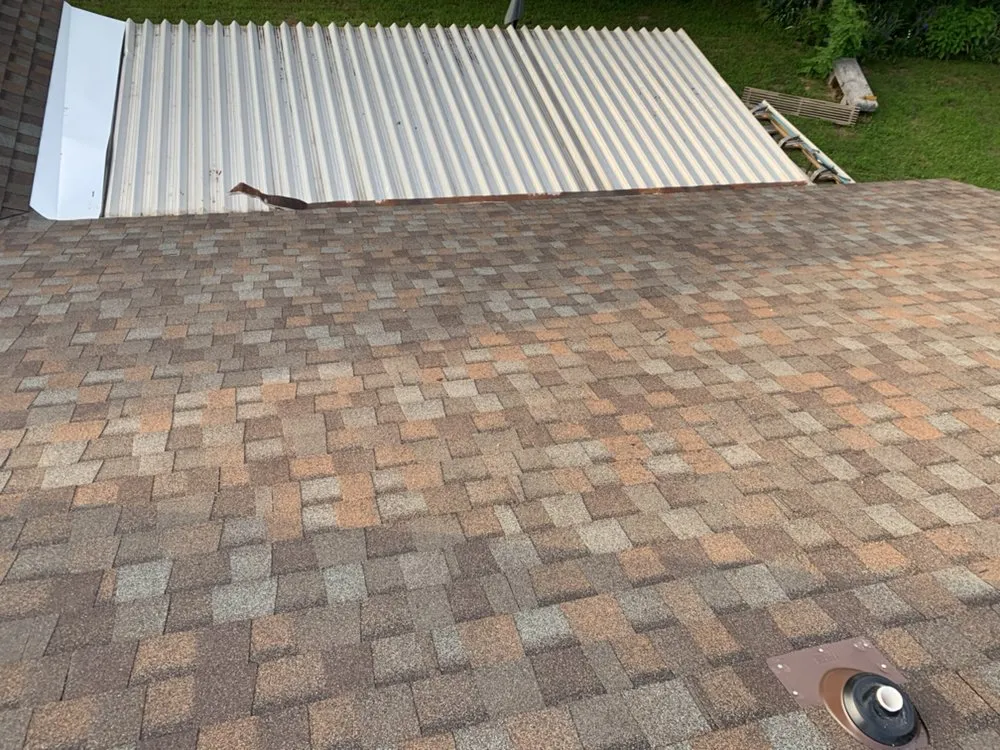 Slide of Charlie's Roofing Windows and More