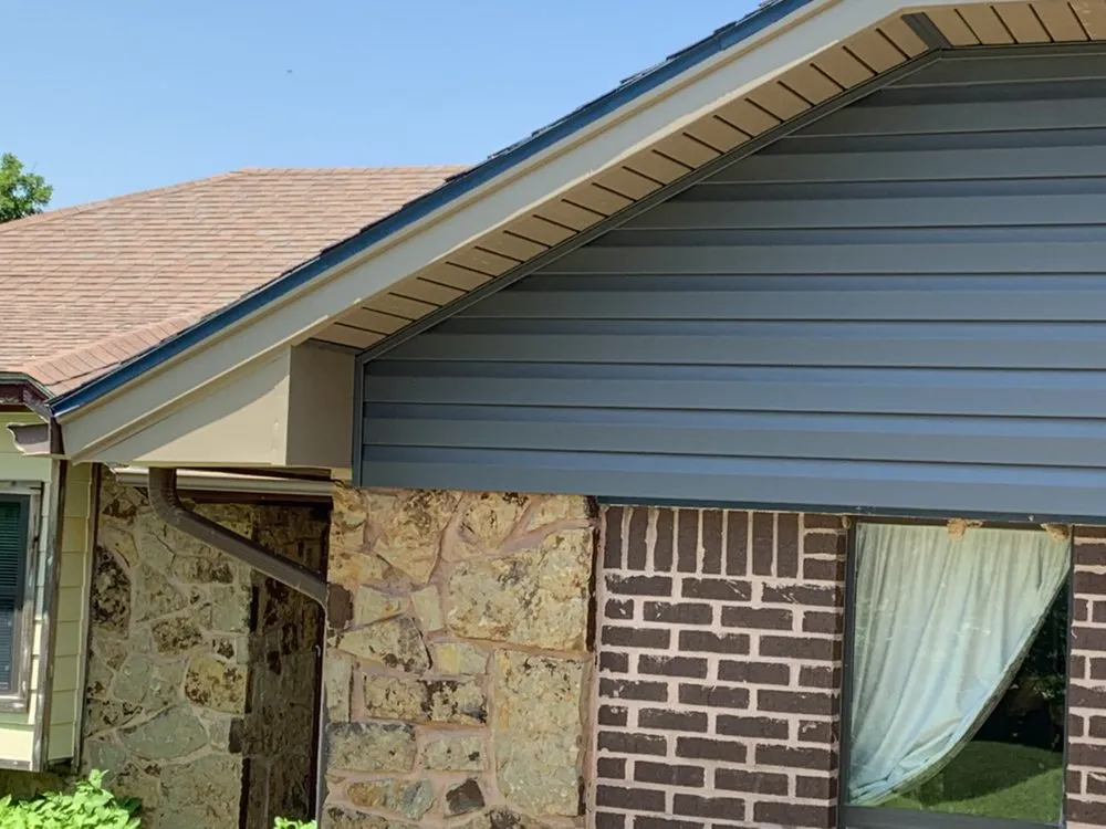 Slide of Charlie's Roofing Windows and More