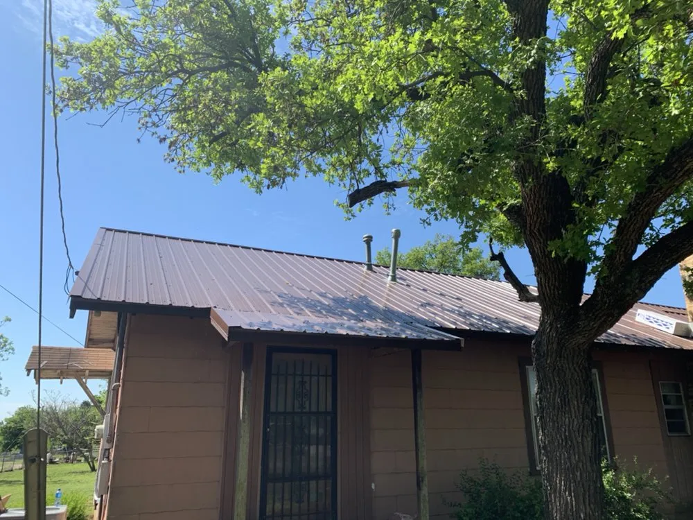 Slide of Charlie's Roofing Windows and More