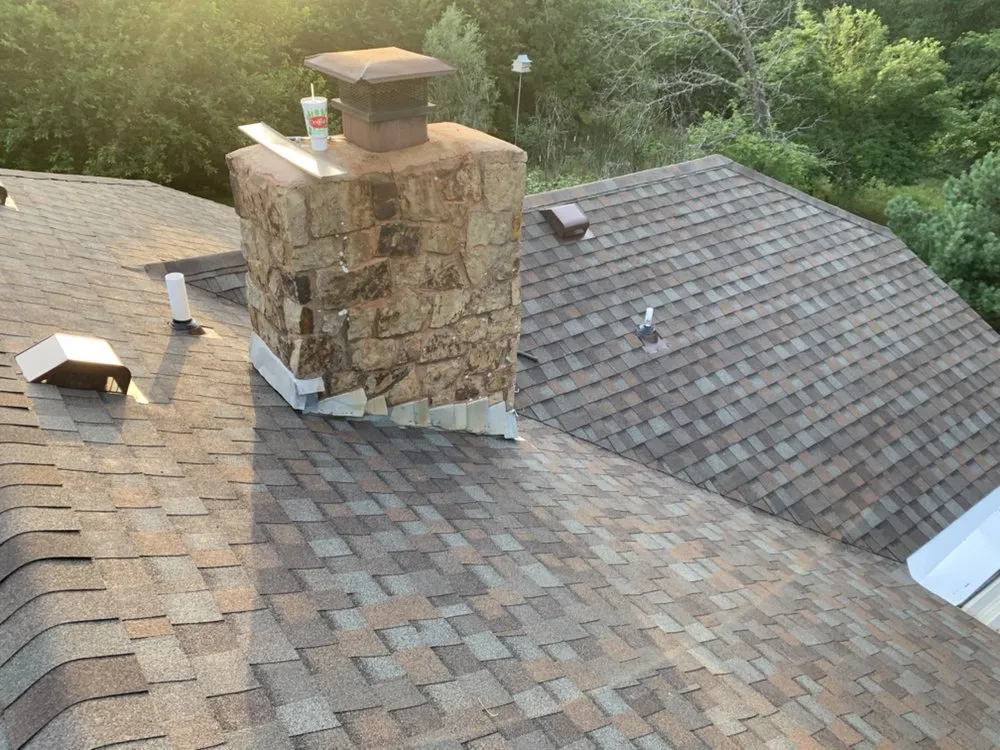 Slide of Charlie's Roofing Windows and More