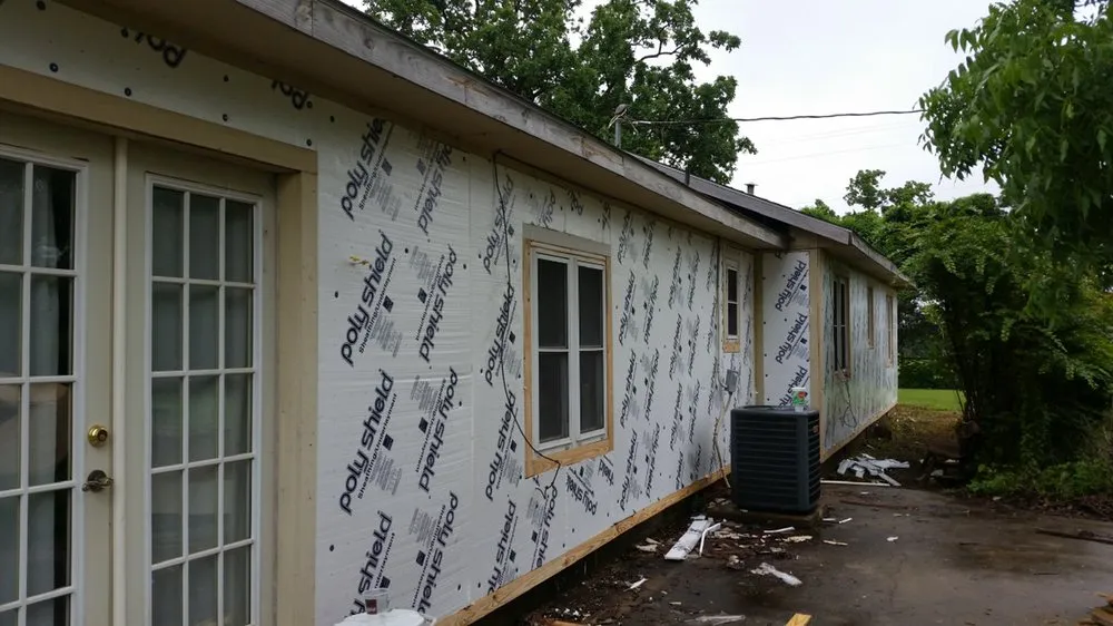 Slide of Charlie's Roofing Windows and More