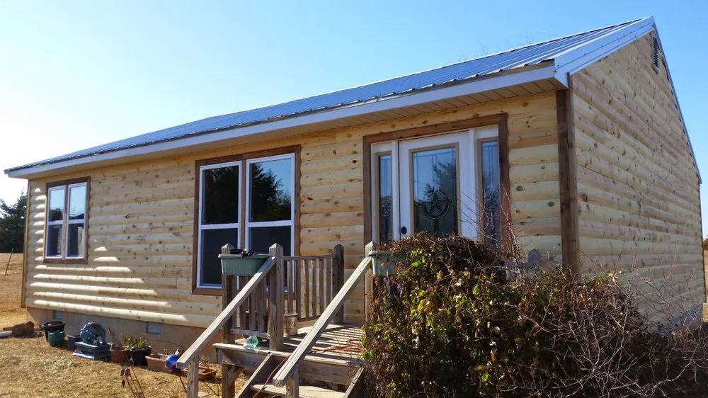 Slide of Charlie's Roofing Windows and More