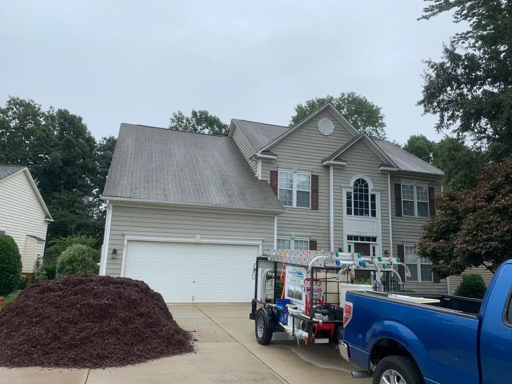 Slide of Charlotte Roof Cleaning