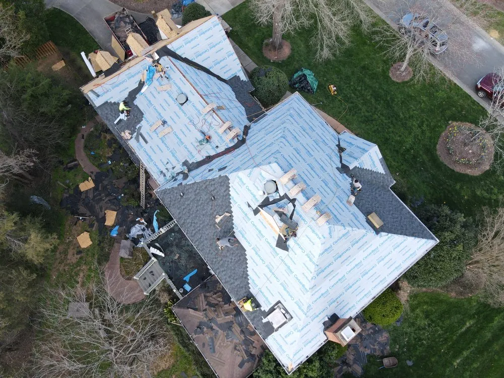 Slide of Charlotte's Best Roofing and Gutters