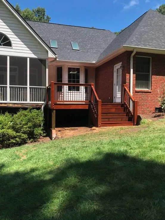 Emergency storm damage roof repair same-day service in Arden, NC by Charly Construction Remodeling