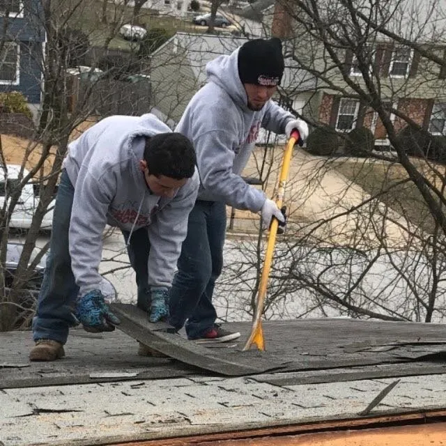 Slide of Charm City Roofing