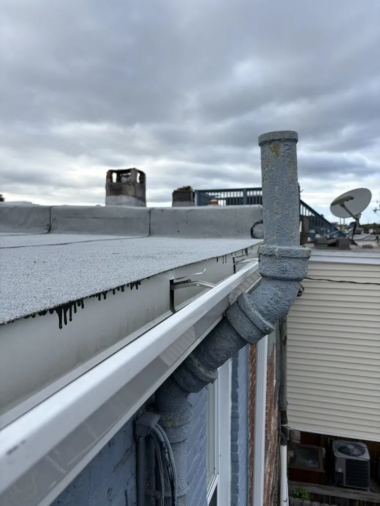 Slide of Charm City Roofing