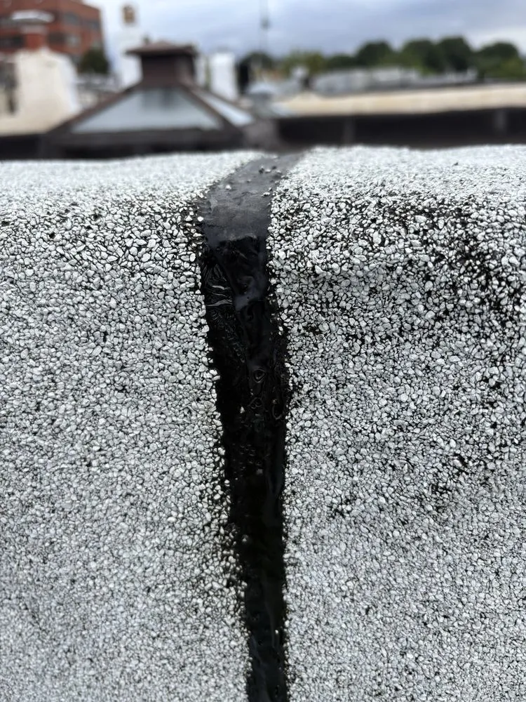 Slide of Charm City Roofing